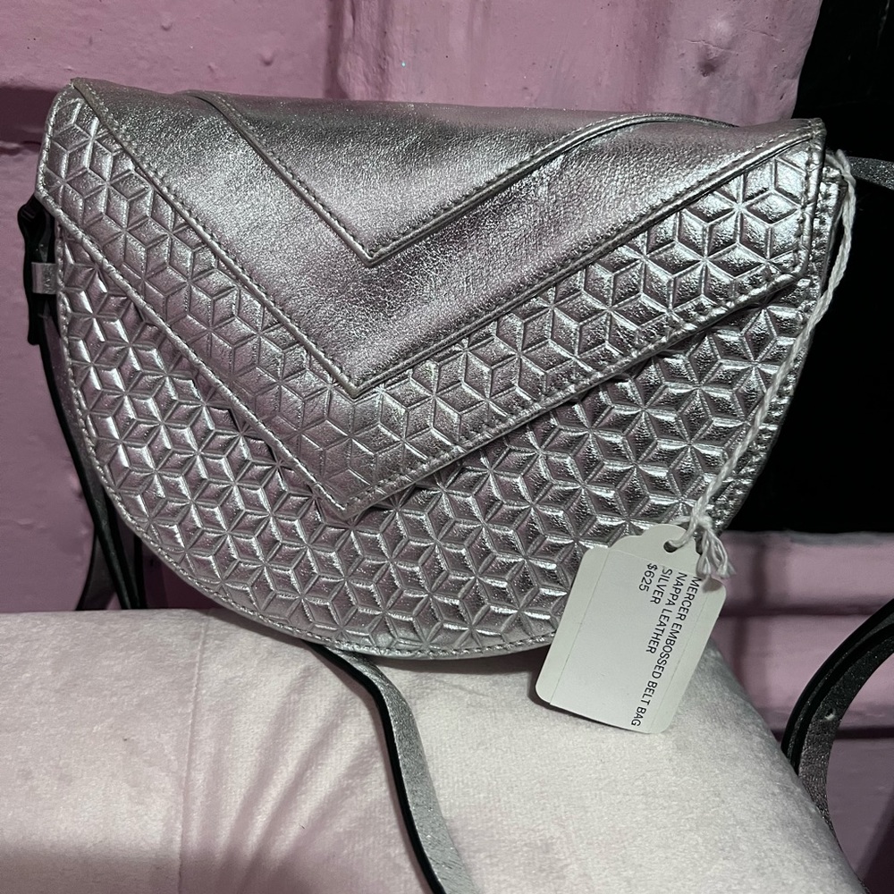 Mercer embossed belt bag can be worn as a crossbody as well.